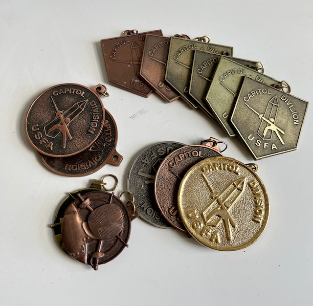 Twelve assorted Capitol Division Medals
